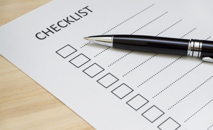 checklist with black pen
