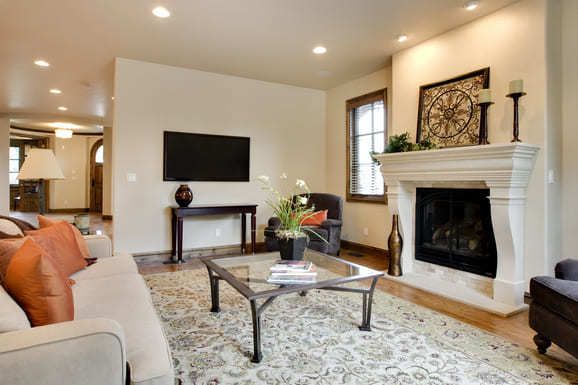Cozy living room with a fireplace and hardwood floors